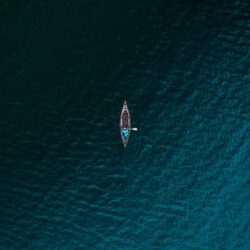https://unsplash.com/photos/aerial-photography-of-person-riding-boat-on-body-of-water-BZlOYIVh8Ss?utm_content=creditShareLink&utm_medium=referral&utm_source=unsplash