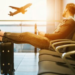 https://unsplash.com/photos/man-sitting-on-gang-chair-with-feet-on-luggage-looking-at-airplane-mSESwdMZr-A?utm_content=creditShareLink&utm_medium=referral&utm_source=unsplash