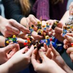 https://unsplash.com/photos/people-holding-miniature-figures-1FI2QAYPa-Y?utm_content=creditShareLink&utm_medium=referral&utm_source=unsplash