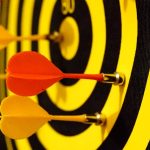 https://unsplash.com/photos/black-and-yellow-dartboard-with-magnet-darts-2Sd1kYW3h1Y?utm_content=creditShareLink&utm_medium=referral&utm_source=unsplash